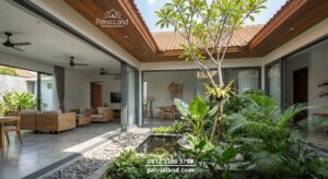 Konsep rumah minimalis tropis dengan taman dalam atau inner court untuk sirkulasi udara sejuk karya Patrialand.