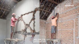 Ilustrasi dinding rumah yang terpaksa dibobok ulang akibat kesalahan urutan instalasi saat renovasi tanpa kontraktor profesional.